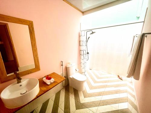 Ванная комната в MAMELLO Beach Club Maldives
