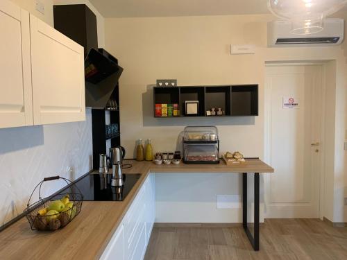 Η κουζίνα ή μικρή κουζίνα στο Avìe Honey Rooms & Breakfast