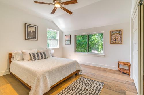a bedroom with a bed and a ceiling fan at Spacious Austin Home Near S Congress and Downtown! in Austin