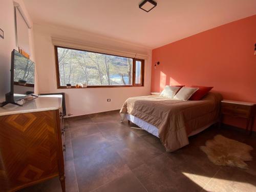 Een bed of bedden in een kamer bij Bosques de ñires