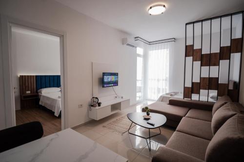 Postel nebo postele na pokoji v ubytování FUYA Apartments