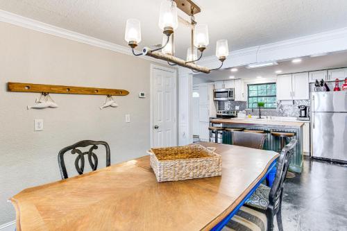 a kitchen with a table with a basket on it at Private Dock and Deck Eagle Mountain Lake Retreat! in Rhome