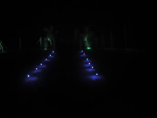 a dark room with lights in the dark at RANCHO PARAISO PARAISO do ZIRINHO in Guapé