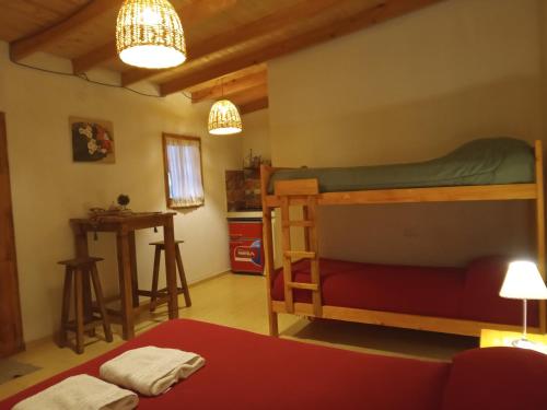 Krevet ili kreveti na kat u jedinici u objektu Cabaña "Amanecer"