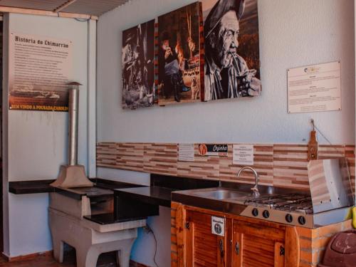 Kuchyň nebo kuchyňský kout v ubytování Pousada Iguassu Charm Suites