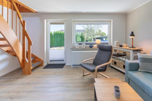 Ruang duduk di Ferienhaus De lütte Mööv