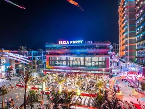 a night view of aislaza party center in a city at Flamigo Ibiza Hải Tiến Tầng 16 in Nam Khê