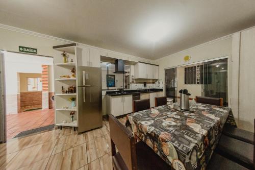 Kuchyň nebo kuchyňský kout v ubytování Pousada Iguassu Charm Suites