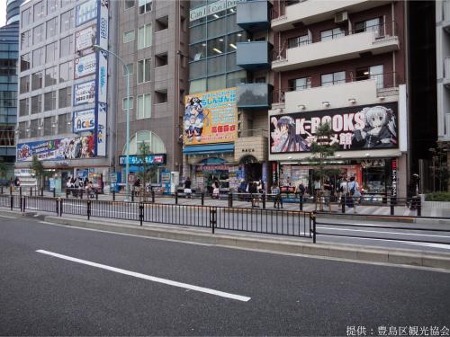 a street in a city with tall buildings at Hotel Wing International Select Ikebukuro in Tokyo