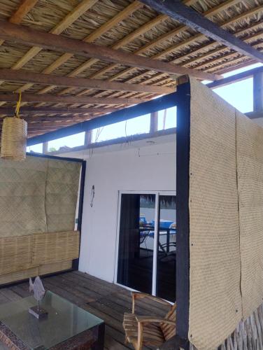 a house under construction with a table and a window at Club Cadena in Acapulco