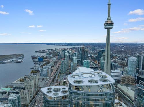 a view of the cn tower and the city at Luxury 2Br Condo Entertainment District Downtown CN Tower View Balcony Pool & Hot Tub in Toronto