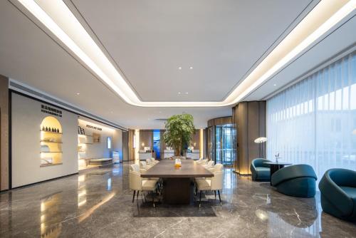 Coin salon dans l'établissement Atour Hotel Shanghai Pudong Airport Zhunan Road