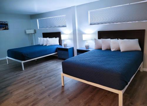 Postel nebo postele na pokoji v ubytování Cerulean Hotel