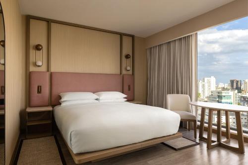 Кровать или кровати в номере Santo Domingo Marriott Hotel Piantini