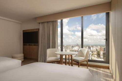 Кровать или кровати в номере Santo Domingo Marriott Hotel Piantini