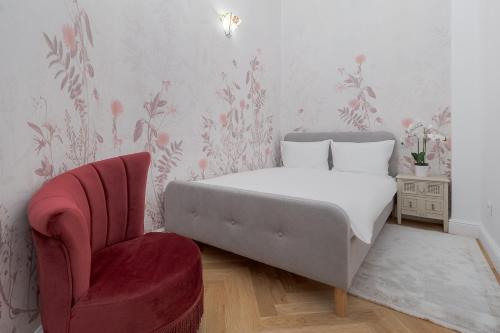 Ένα ή περισσότερα κρεβάτια σε δωμάτιο στο Arta Residence