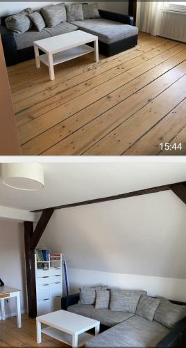 a living room with a couch and a table at Ferienwohnung im Zanderhaus in Sabel