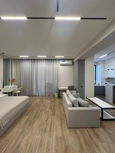 Llit o llits en una habitació de Minor-River apartment