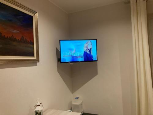 B&B Al Vecchio Mulinoにあるテレビまたはエンターテインメントセンター