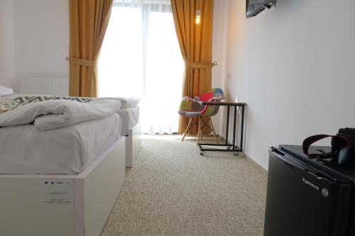 Postel nebo postele na pokoji v ubytování Complex Divad Relax