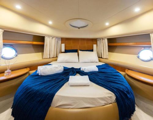 a bed in the middle of a boat at EA Antalya Yatch in Kemer