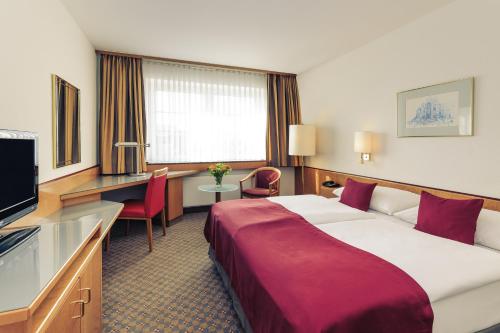 Μια τηλεόραση ή/και κέντρο ψυχαγωγίας στο Mercure Hotel Köln City Friesenstraße