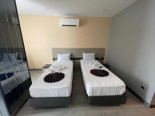 Letto o letti in una camera di Agora Royal Residence