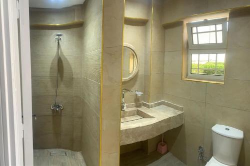 Ένα μπάνιο στο Twin house Marseilia beach 3 north coast with golf car