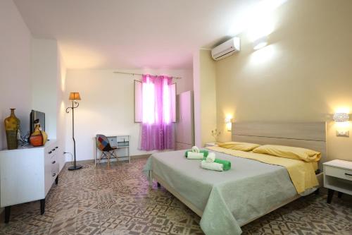 Posteľ alebo postele v izbe v ubytovaní B&B Casita GioJa
