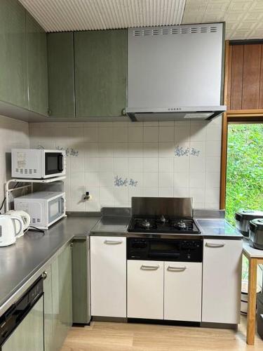 Una cocina o zona de cocina en 笑竹庵