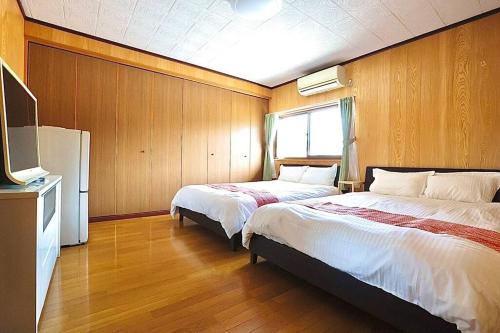 Cama o camas de una habitación en 笑竹庵