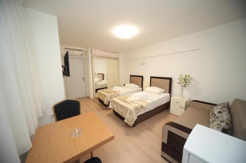 En eller flere senger på et rom på Beyazköşk Otel