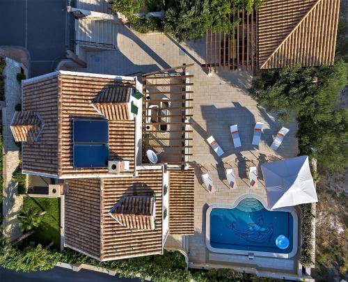 Kolam renang di atau dekat dengan Ferienhäuser in Makarska