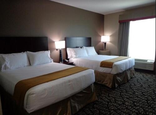Postel nebo postele na pokoji v ubytování Holiday Inn Express and Suites Lubbock South by IHG