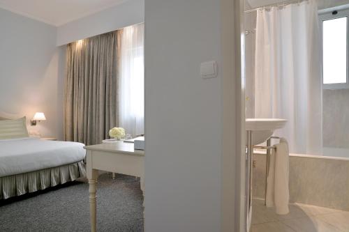 Cama o camas de una habitación en Airotel Stratos Vassilikos Hotel