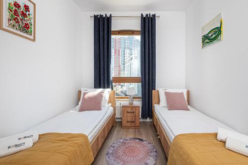 Posteľ alebo postele v izbe v ubytovaní Nova Letnica 2 - BillBerry Apartments
