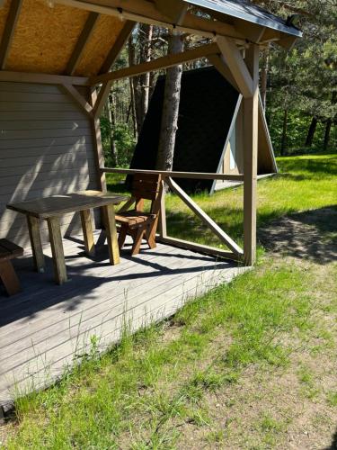 Taman di luar Trommeļa brīvdienu mājiņas-kempings