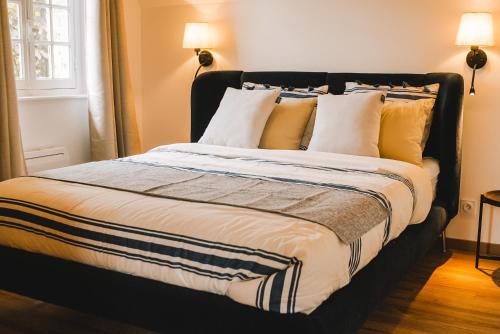 Un pat sau paturi într-o cameră la Normandy Etretat