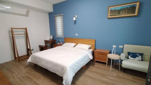Postel nebo postele na pokoji v ubytování Liangchen B&B
