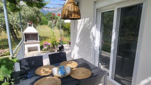 Κήπος έξω από το Ioannis Houses - gemütliches Ferienhaus im Olivenhain
