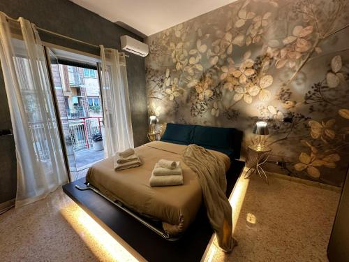 Rome Elements Apartment tesisinde bir odada yatak veya yataklar