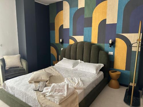 Postel nebo postele na pokoji v ubytování Mandarin Apulia 19 B&B