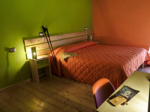 Postel nebo postele na pokoji v ubytování S'Osteria 38