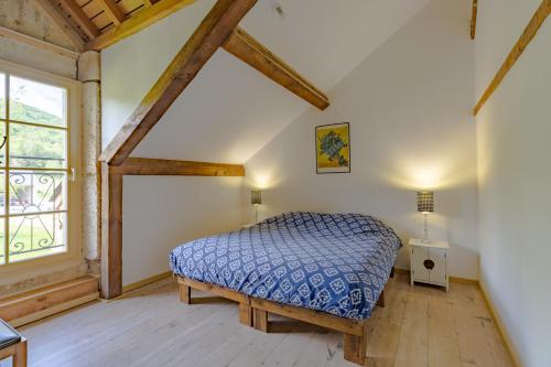 Кровать или кровати в номере Gîte 3