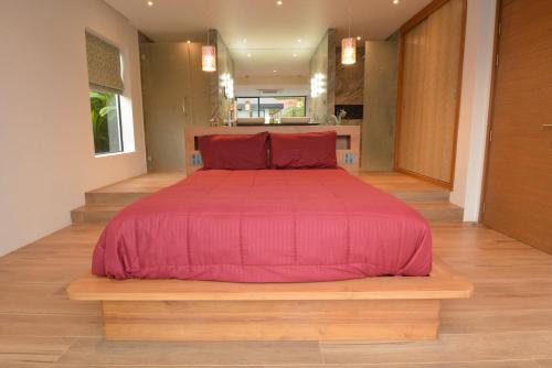 Giường trong phòng chung tại VILLA Pak Dang