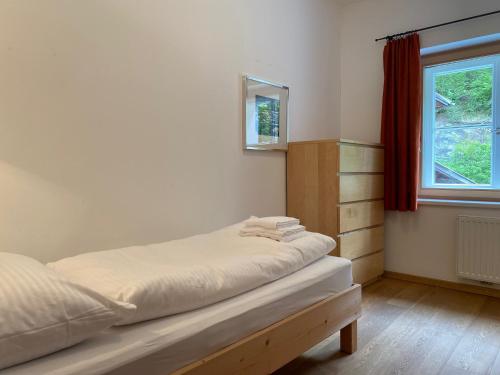 Llit o llits en una habitació de Gasthof Kronburg