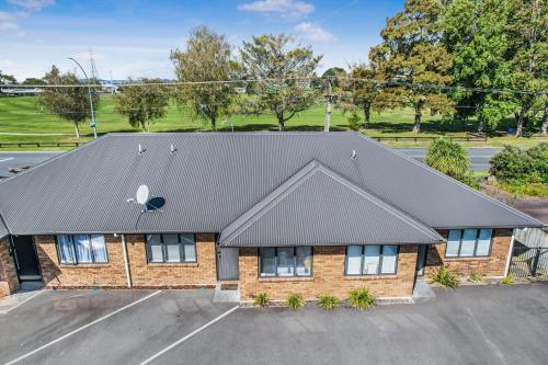 an overhead view of a brick house with a black roof at Park view, Proximity, Value in Hamilton