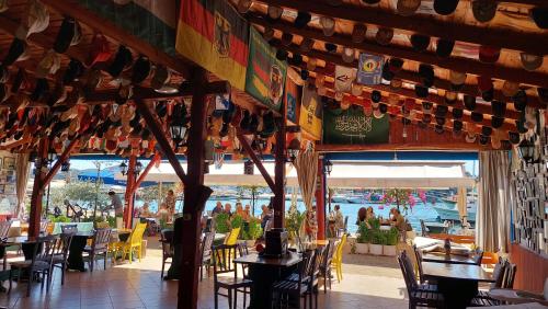A restaurant or other place to eat at Kekova Hassan's Pansiyon