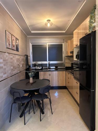 Una cocina o cocineta en Luxe appartement Berkane