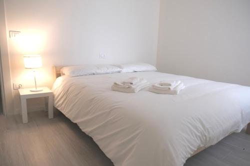 Ein Bett oder Betten in einem Zimmer der Unterkunft La Villa Suite 1